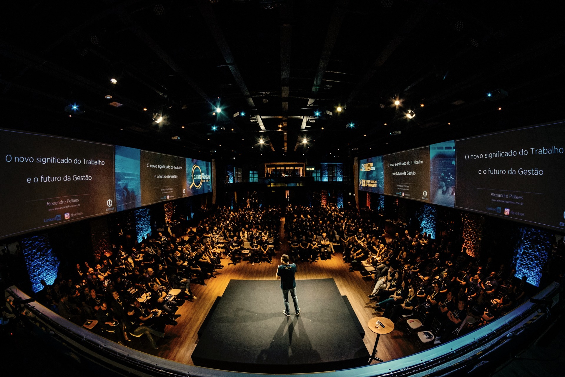 people sitting on chairs watching a game